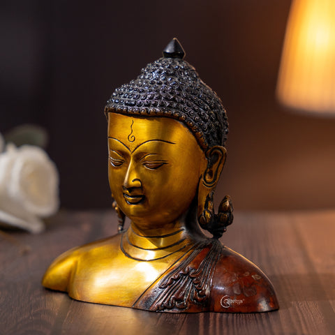 Side angle of Nepali Brass Buddha Murti Bust showing intricate shawl details.