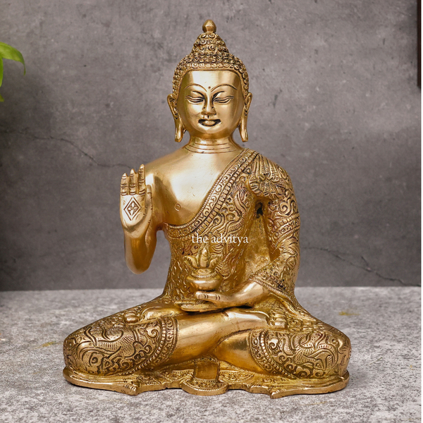 Intricate carving details on an authentic brass Buddha statue.