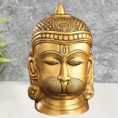 Brass engraved Hanuman statue front view with detailed facial carving and traditional craftsmanship.