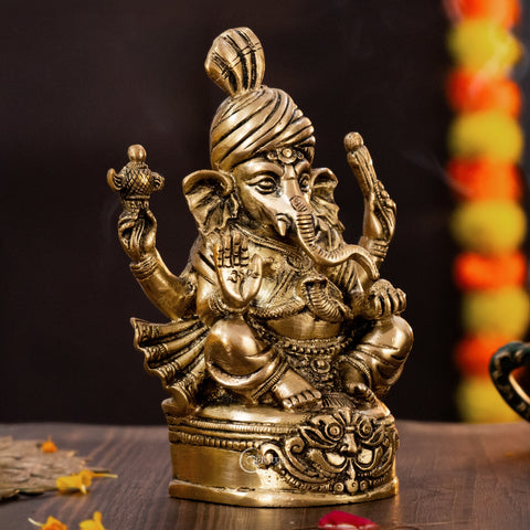 Right side view of 7 inch Brass Vighnaharta Ganesha idol with pagdi and antique finish