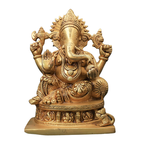 Brass Ganesha Statue four-handed Vinayaka idol with modak on white background