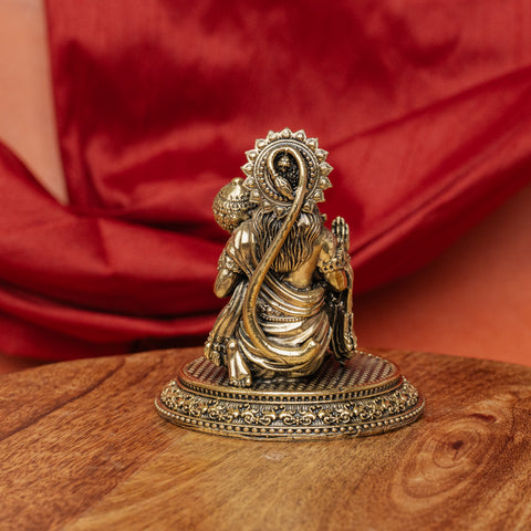 Full length back view of a handcrafted brass Hanuman statue with ornate detailing