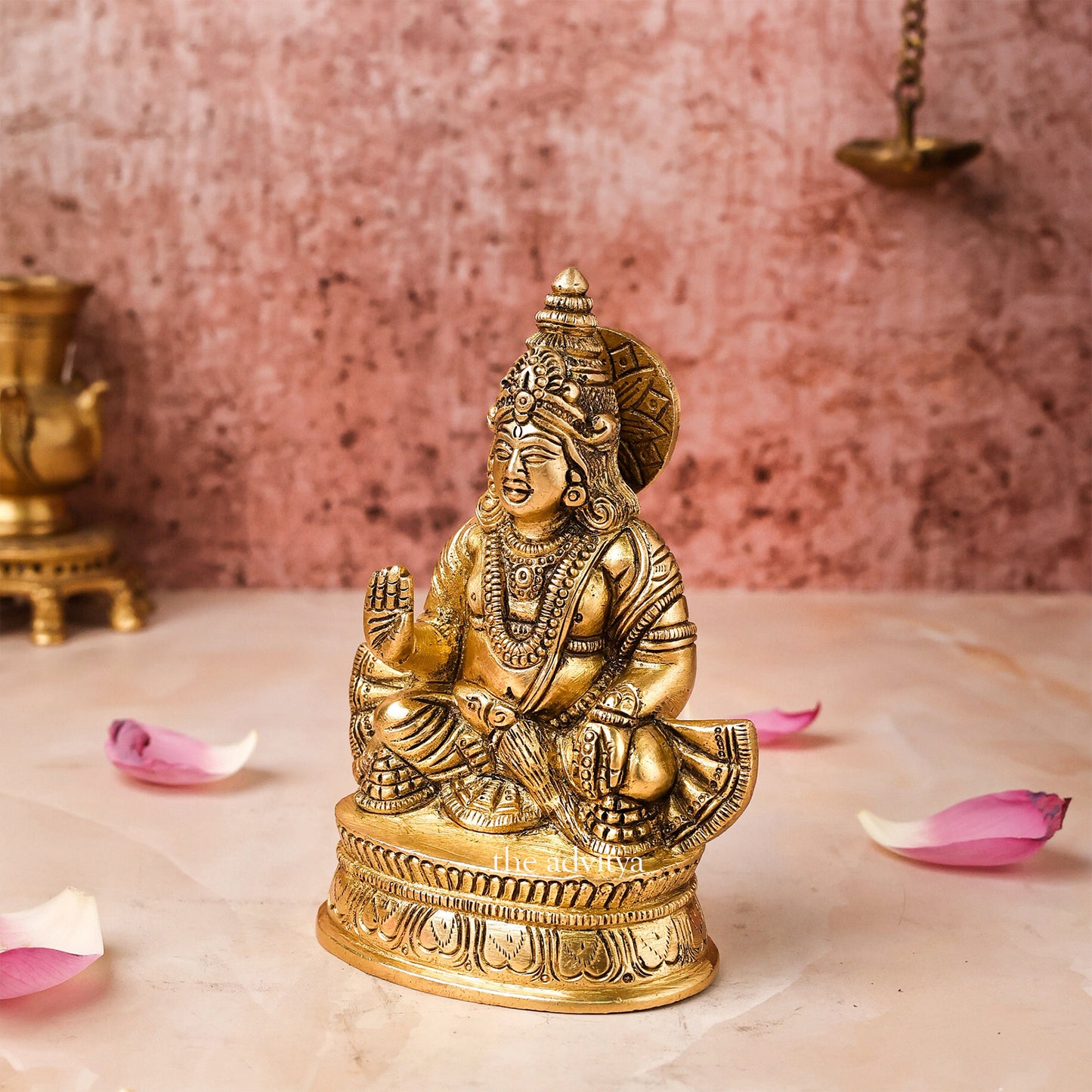 Left side angle of Brass Kuber Statue with detailed chowki base