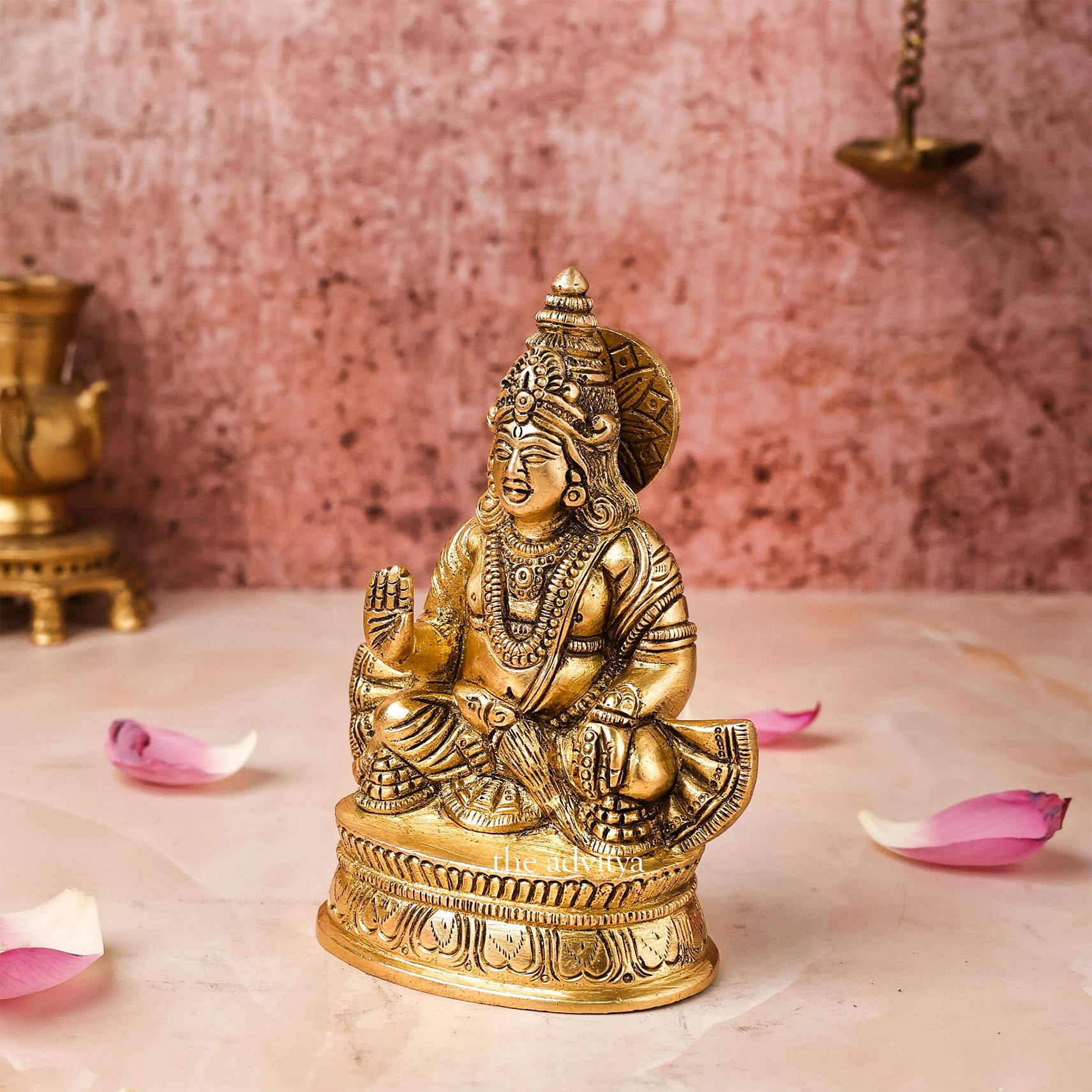 Left side angle of Brass Kuber Statue with detailed chowki base