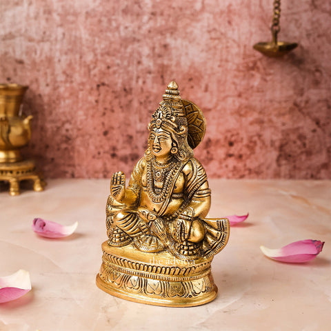 Left side angle of Brass Kuber Statue with detailed chowki base