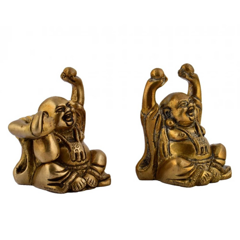 Left angle view of brass laughing Buddha idols symbolizing happiness
