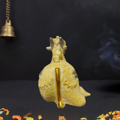 Back view brass Nandi idol showing sand finish texture and intricate hand-carved detailing.
