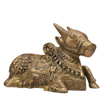 Close-up of intricate carving on brass Nandi Maharaj statue.