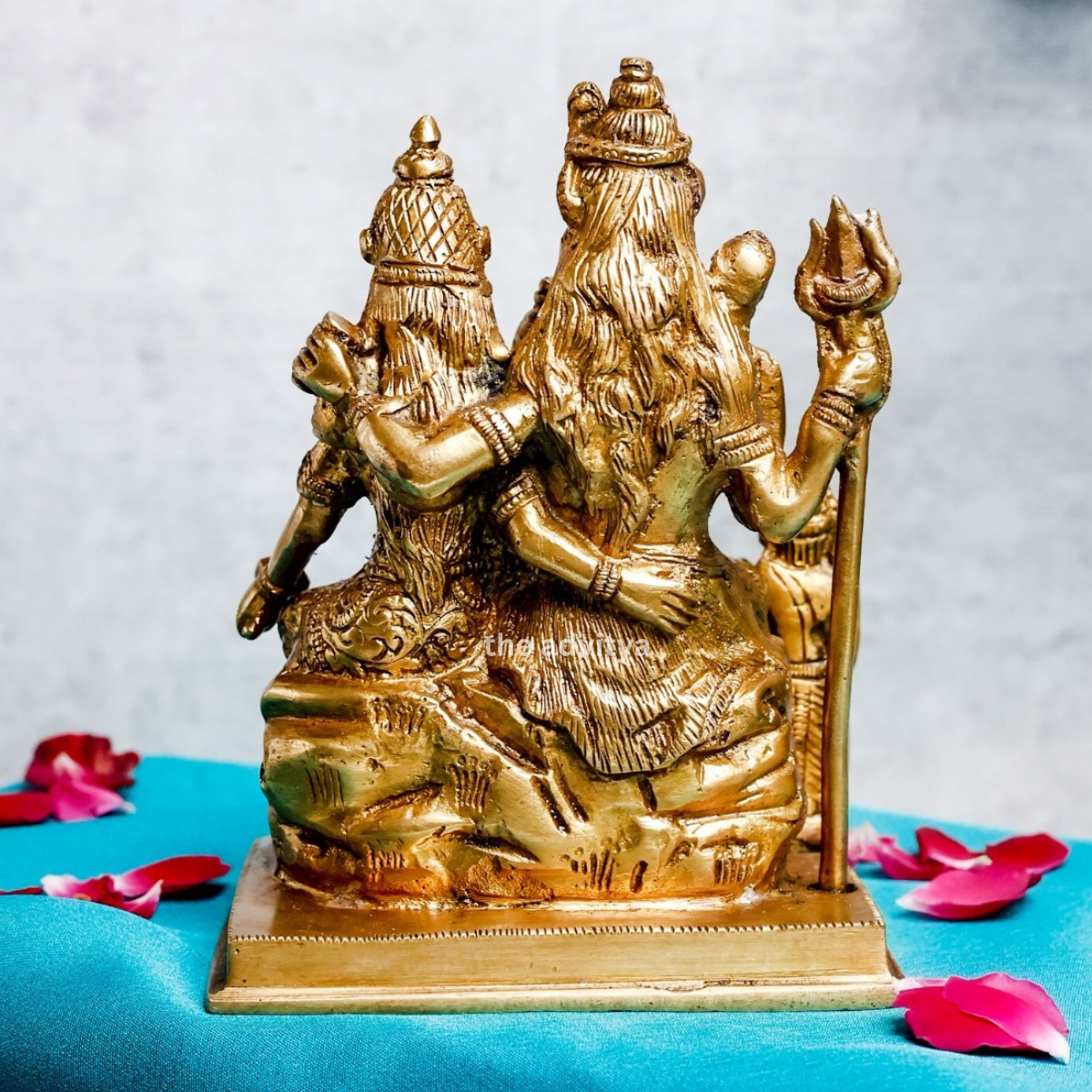 Back view of brass Shiv Parivar murti medium with traditional design.