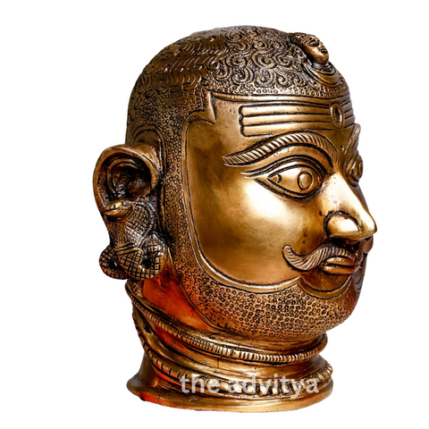 Left side angle of brass Shiva Head showing serene facial features and detailing with a white background.