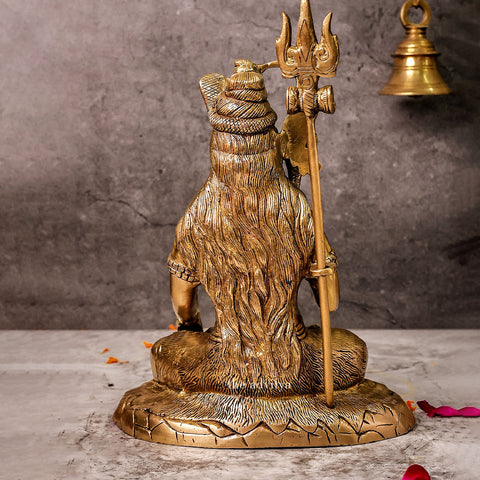 Back view detailing craftsmanship of Brass Shiva Statue on lion mat.