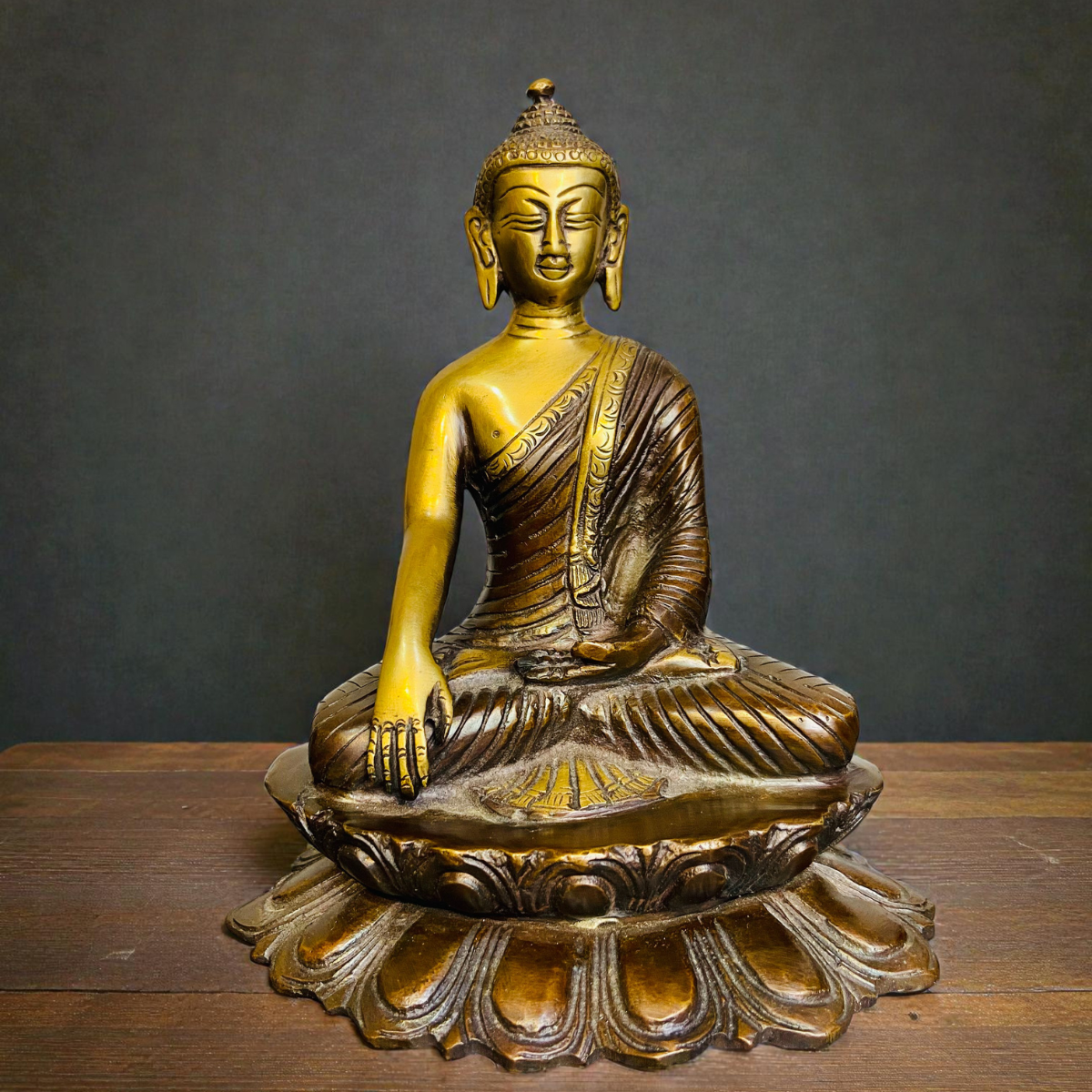 Close-up of brass sitting Buddha sculpture with fine detailing