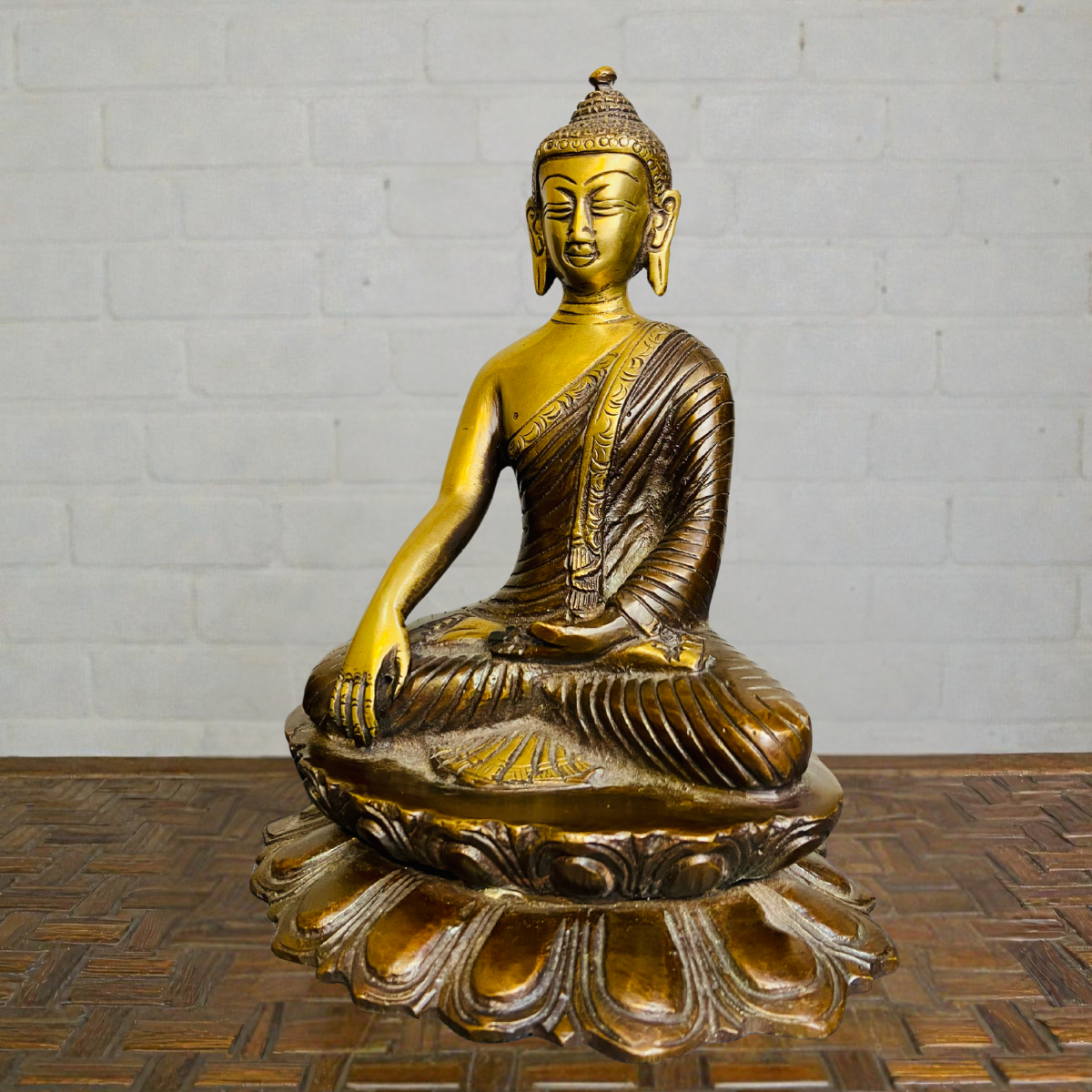 Left side view of brass sitting Buddha statue for home décor