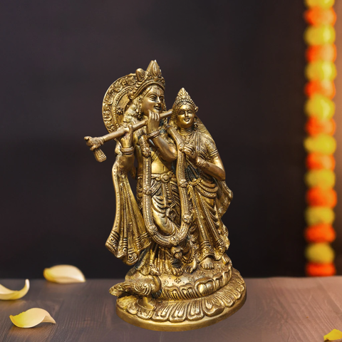 Side view of brass standing Radha Krishna idol for home temple