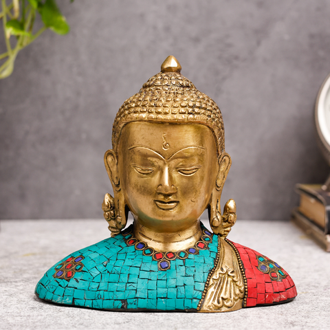 Close-up view of Buddha sculpture highlighting intricate stone detailing