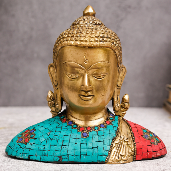 Brass Tibet Buddha sculpture with stone work displayed as elegant home décor.