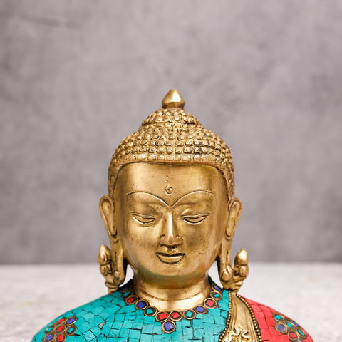Brass Tibet Buddha sculpture with stone work.