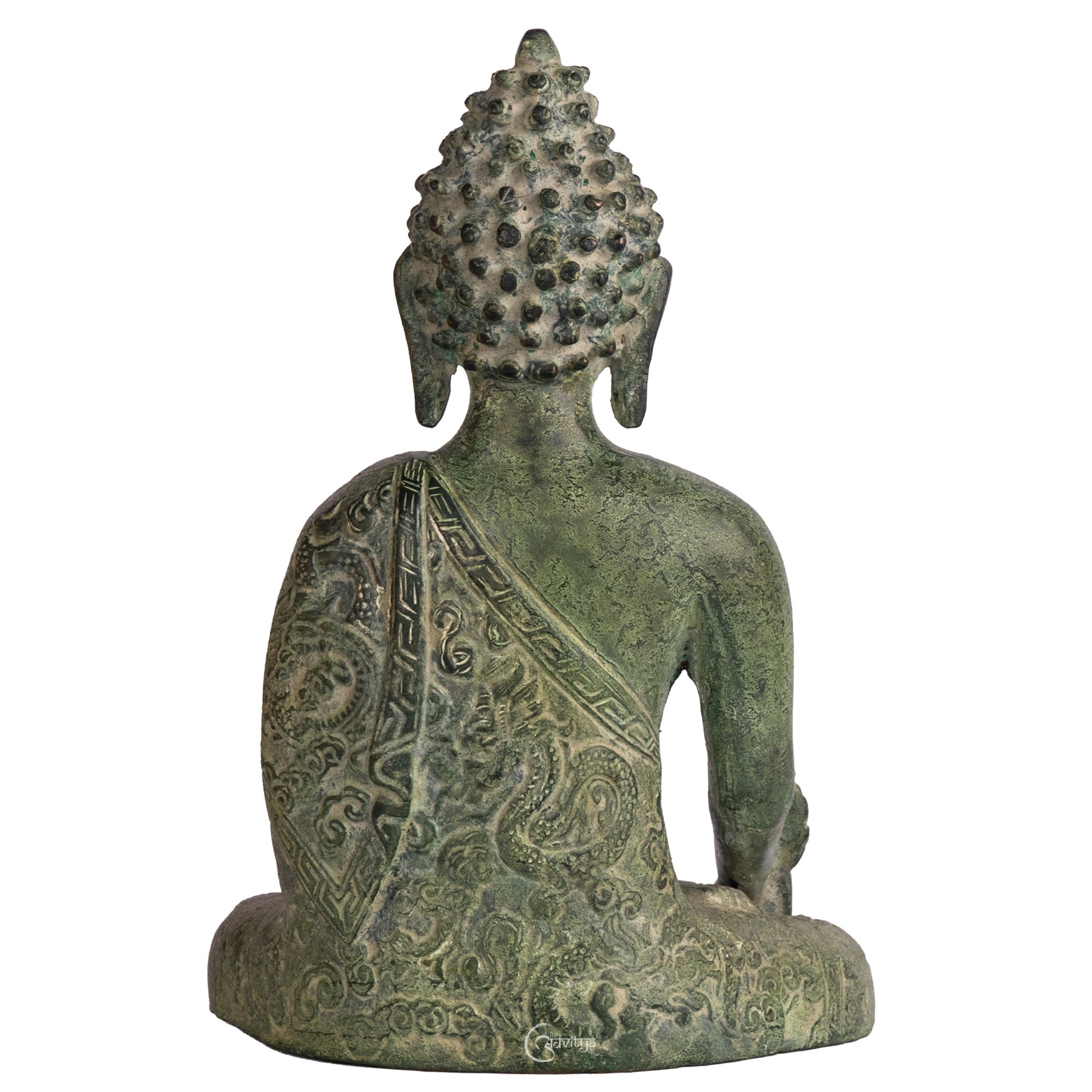 Brass Tibetan Buddha statue in earthy tones, reflecting artisanal craftsmanship.