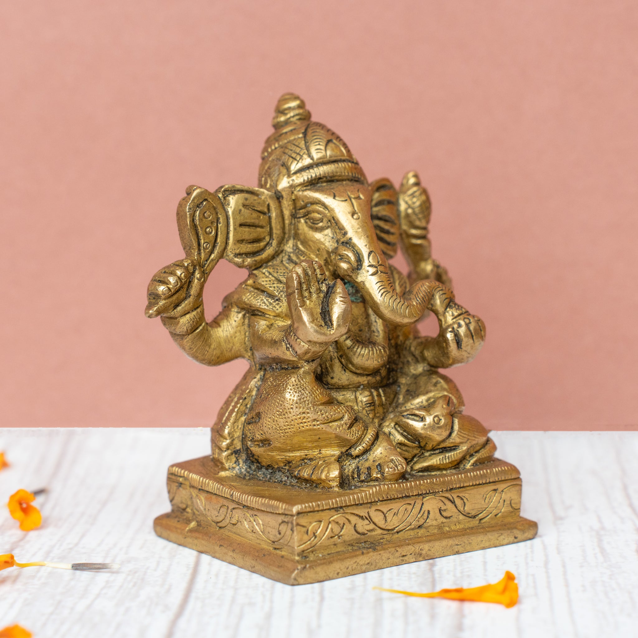 Left side view of 3.2-inch brass Ganesh Idol showing intricate detailing for pooja and gifting