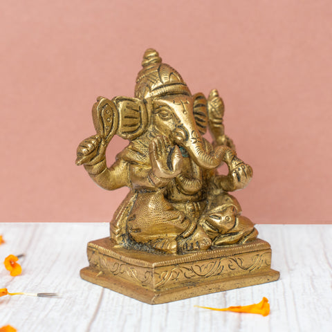 Left side view of 3.2-inch brass Ganesh Idol showing intricate detailing for pooja and gifting