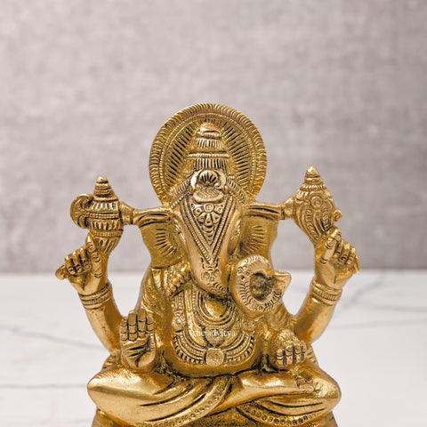 Brass Ganesh Idol Svarup with four hands holding Shankh