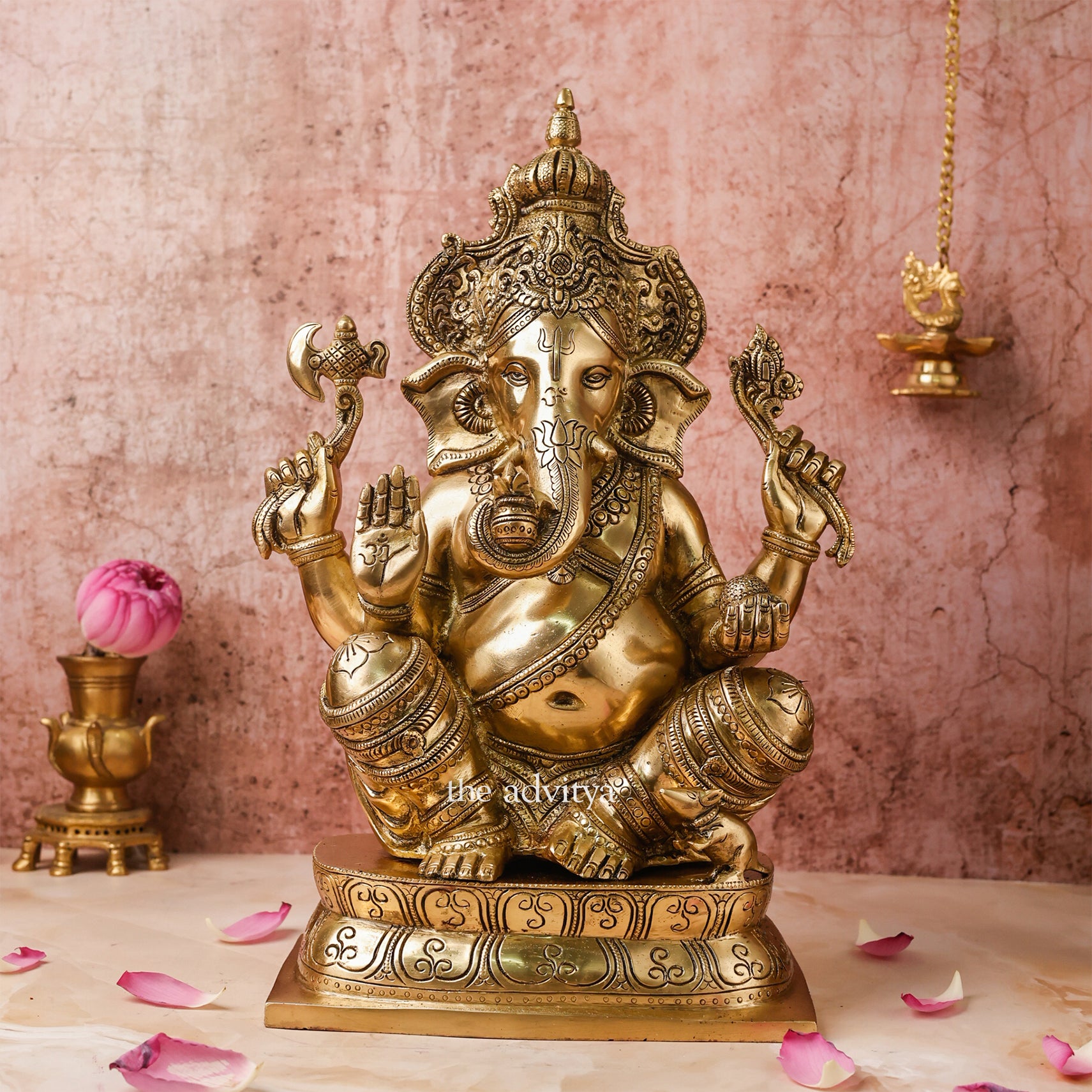Handcrafted 15.5-inch brass Ganesha statue with crown, perfect for pooja and home décor.