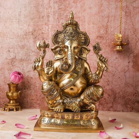 Handcrafted 15.5-inch brass Ganesha statue with crown, perfect for pooja and home décor.