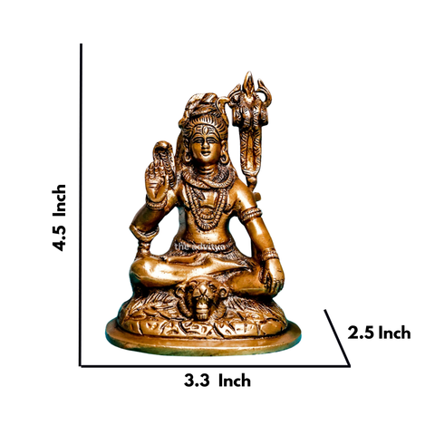 Close-up view of a handcrafted brass Shiva statue with fine facial detailing.