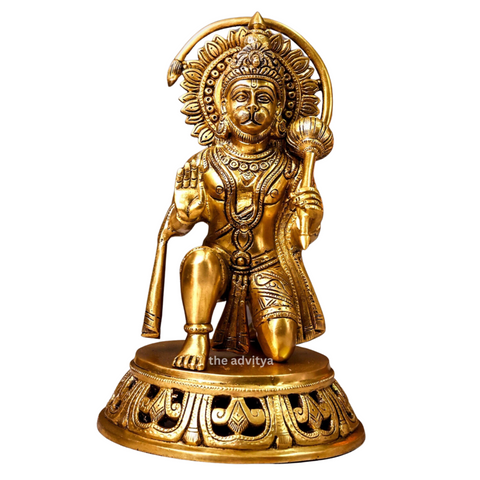 Large brass Hanuman idol in sitting posture with blessing hand, front view with white background.