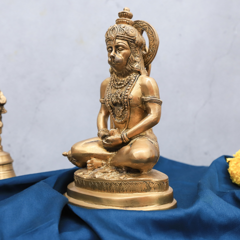 Left angle view of brass Hanuman statue in meditating mudra