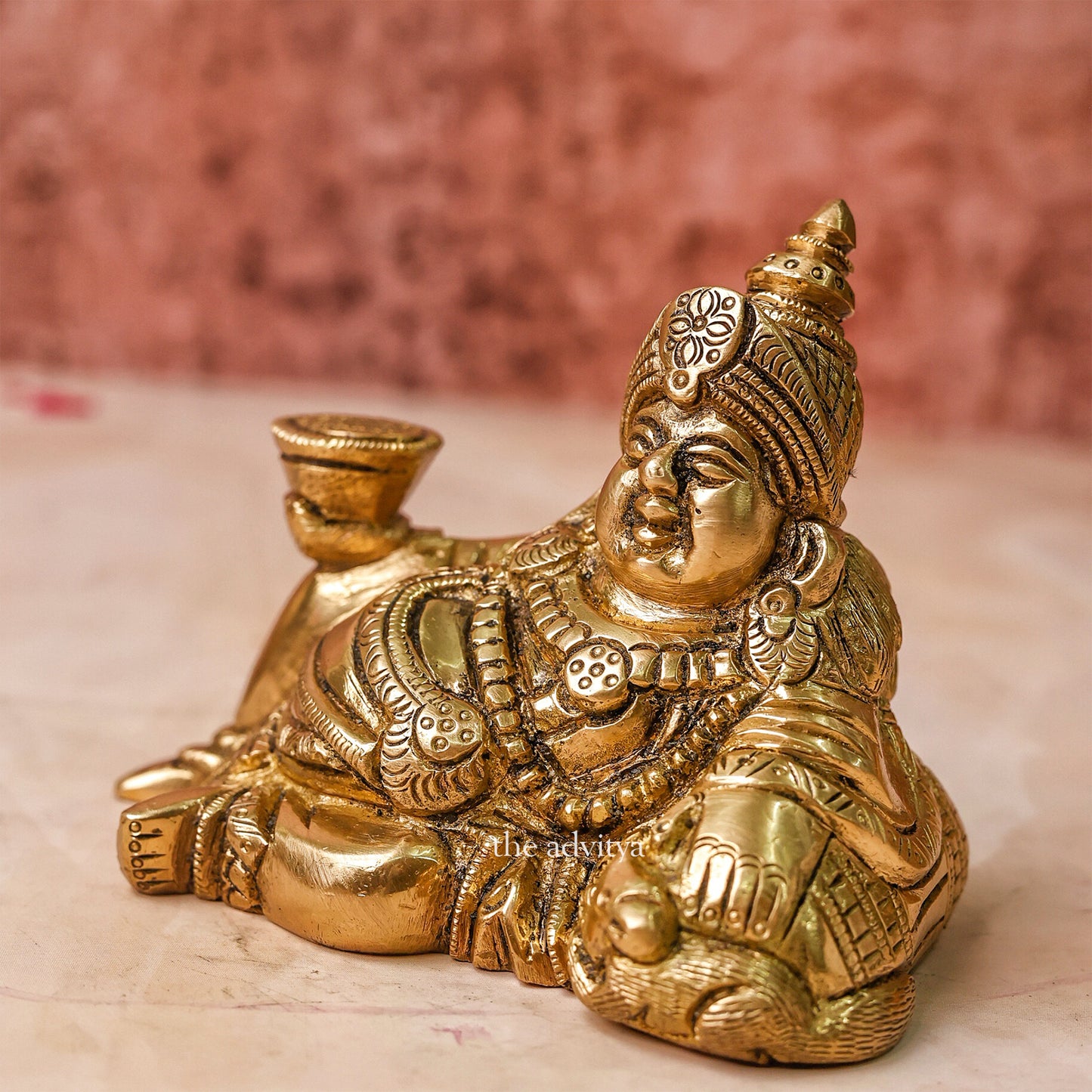 Kubera Murti reclining form left angle showing fine detailing