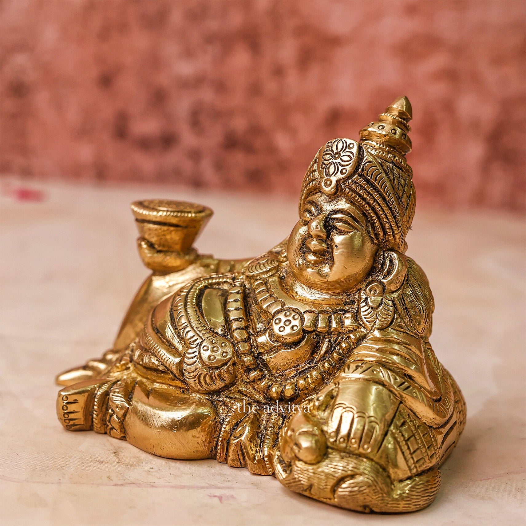 Kubera Murti reclining form left angle showing fine detailing