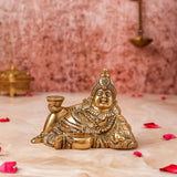Kubera Murti reclining form front view symbolizing abundance.