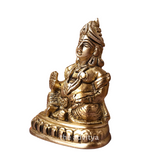 Kubera Statue sitting on a base, left angle, with fine craftsmanship, without a background.