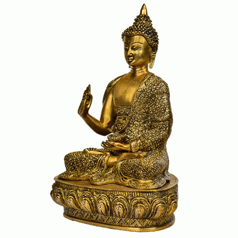 large brass sitting Buddha statue with detailed carving.
