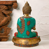 Back view of the brass Buddha Murti showing mosaic craftsmanship.
