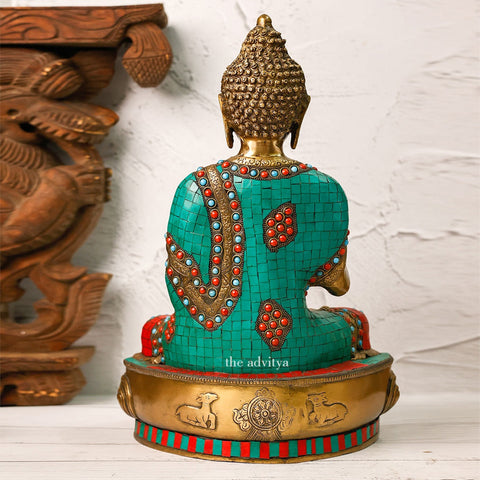 Back view of the brass Buddha Murti showing mosaic craftsmanship.