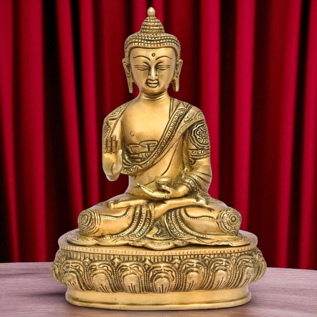 Peaceful sitting Buddha brass statue shown from the front, featuring calm facial expression and detailed hand mudra