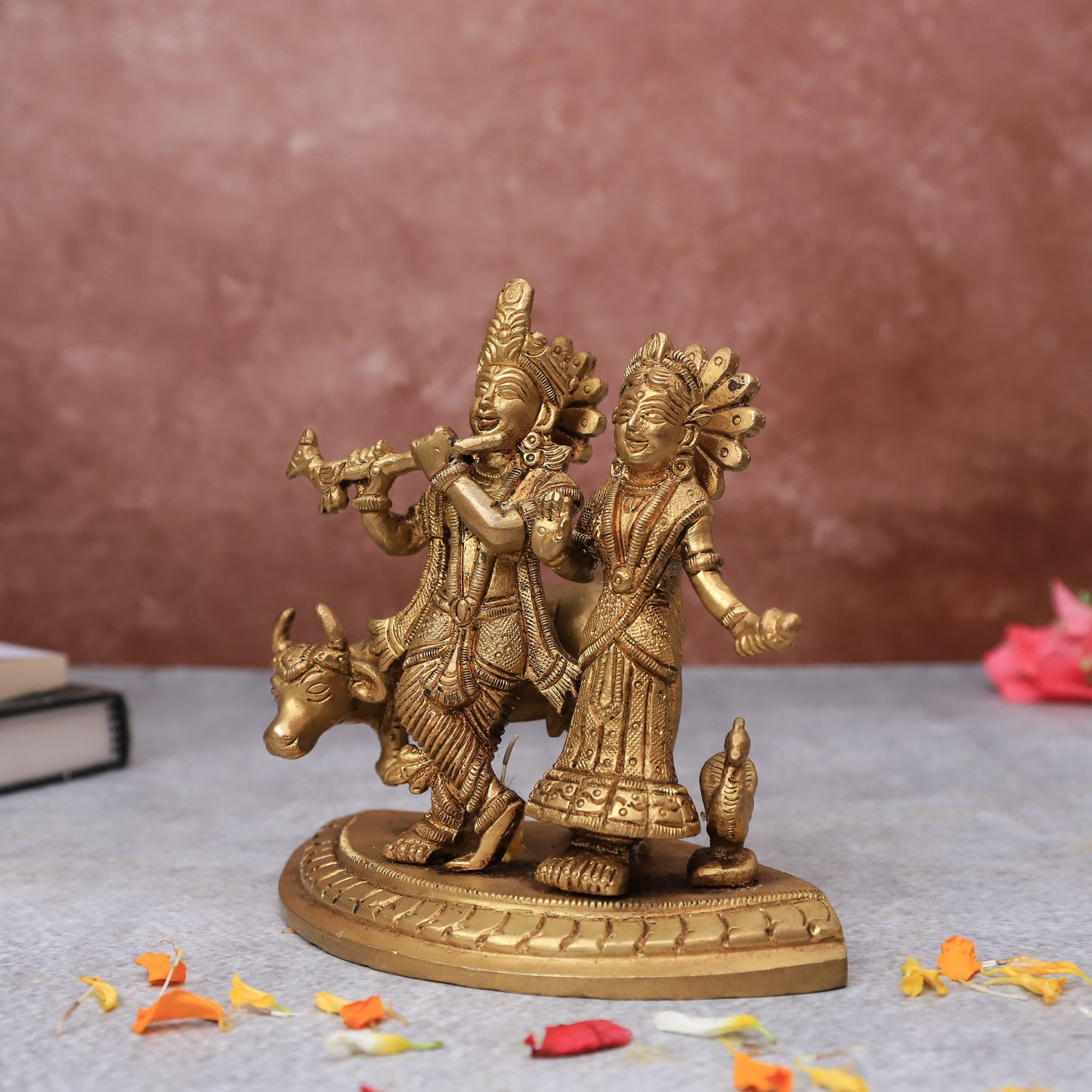 Left angle of Radha Krishna statue with cow showing intricate craftsmanship for pooja room.