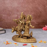 Left angle of Radha Krishna statue with cow showing intricate craftsmanship for pooja room.