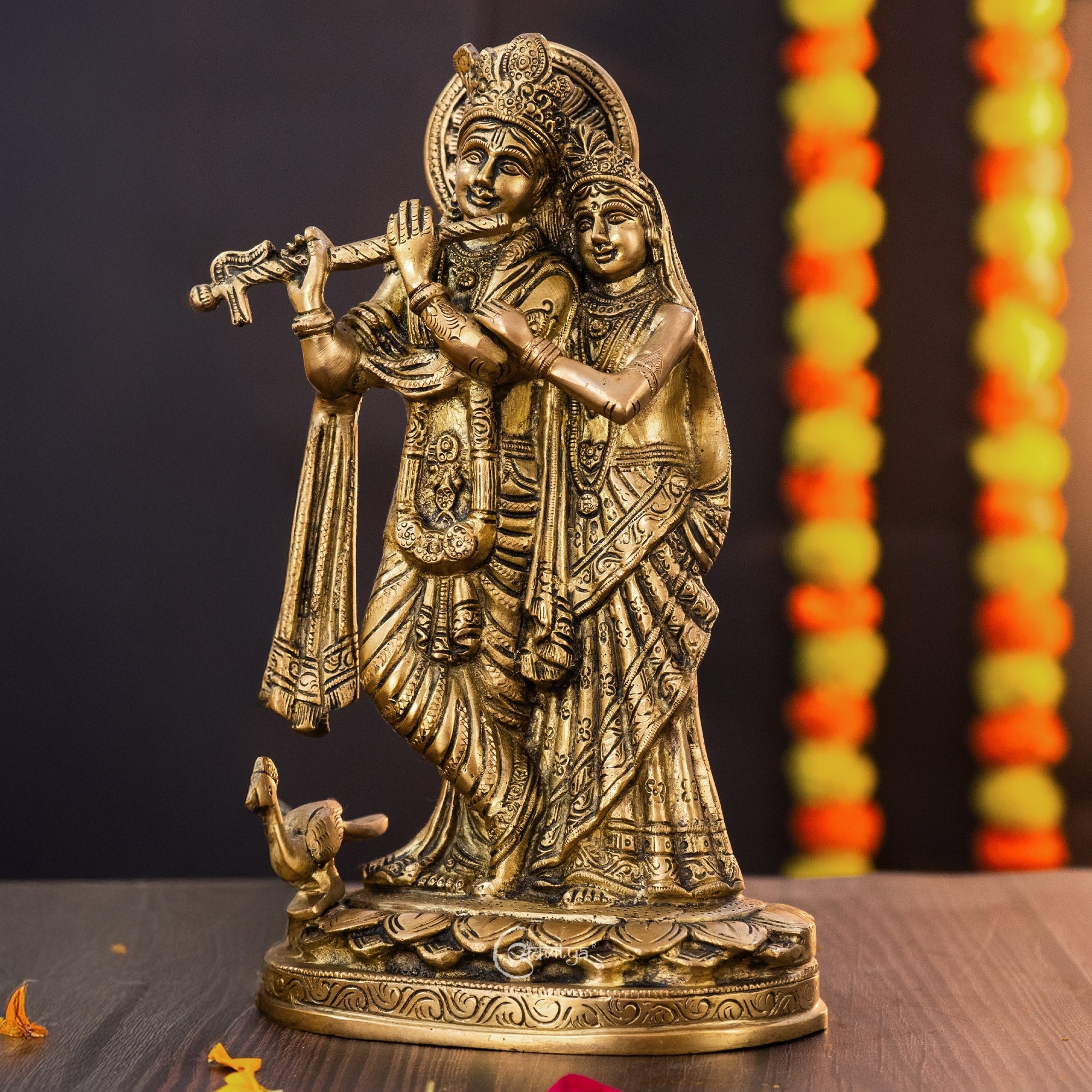 Side angle view of Radha Krishna Murti highlighting elegant posture and fine detailing.