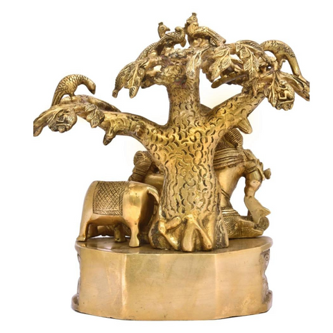 Radha Krishna statue back view under the tree for the pooja room placement.