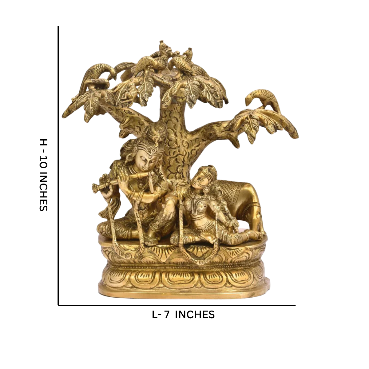 Close detail of the Radha Krishna statue under the tree showing fine craftsmanship.