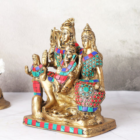 Left angle view of brass Shiv Parivar Statue with detailed stone work design.