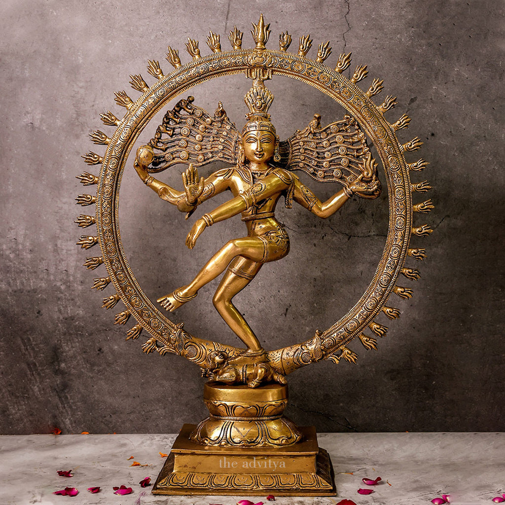 Front view of a brass Nataraja Shiva statue showing the dancing posture and intricate details.