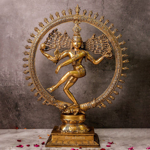 Front view of a brass Nataraja Shiva statue showing the dancing posture and intricate details.