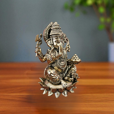 Right angle view of super fine brass Ganesha statue with traditional brass finish.