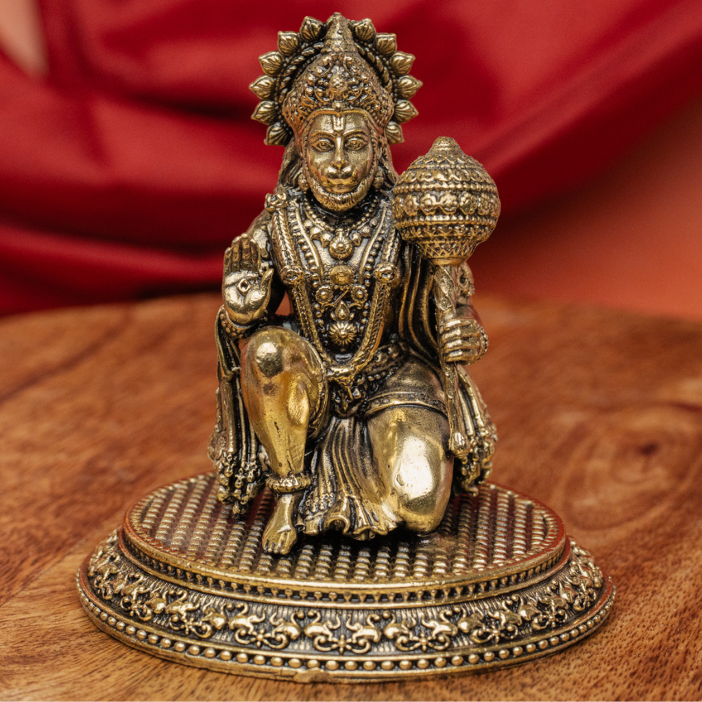 Front view of a super fine brass Hanuman statue in sitting posture