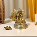 Brass Krishna Idol with Flute & Peacock Feather Backdrop Design