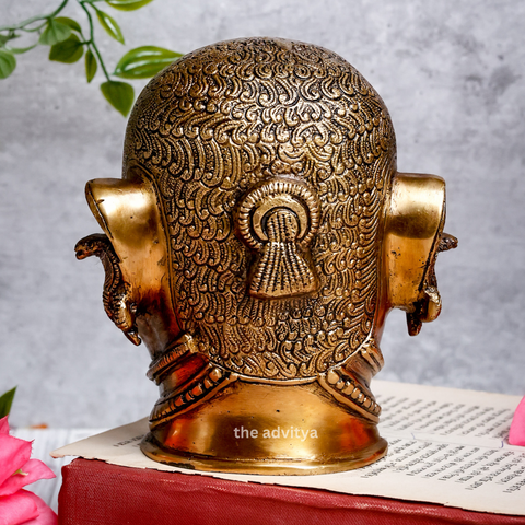 Back view of brass Shiva Head sculpture showing smooth finish and craftsmanship.